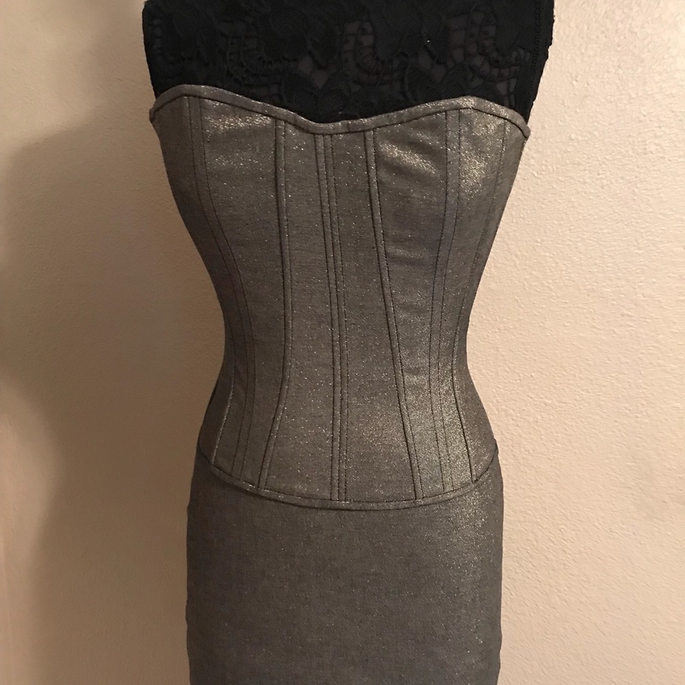 Fernando Wong 2 piece corseted suit.